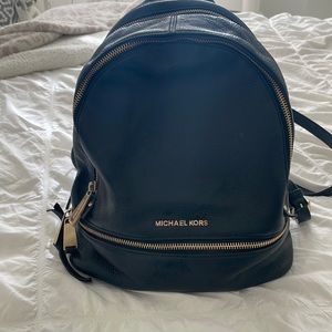 michael kors black leather back pack